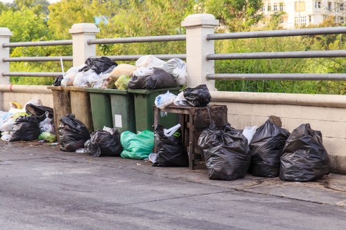 Loading Waste into a Skip in Norwood